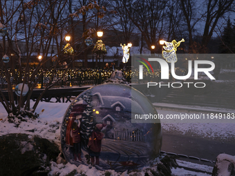 Christmas decorations and lights adorn the streets of Kharkiv, Ukraine, on December 7, 2024. (