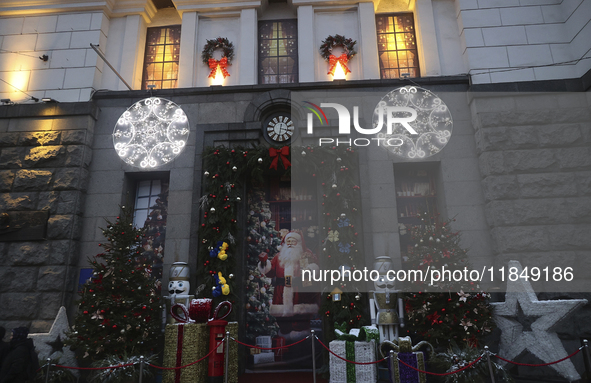 Christmas decorations and lights adorn the streets of Kharkiv, Ukraine, on December 7, 2024. 