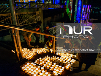 To commemorate World Candle Day, around 18,000 candles are lit in Nijmegen, The Netherlands, on December 8, 2024, to remember all deceased c...