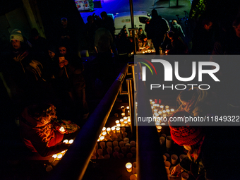 To commemorate World Candle Day, around 18,000 candles are lit in Nijmegen, The Netherlands, on December 8, 2024, to remember all deceased c...