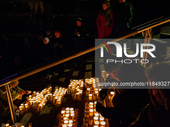 To commemorate World Candle Day, around 18,000 candles are lit in Nijmegen, The Netherlands, on December 8, 2024, to remember all deceased c...