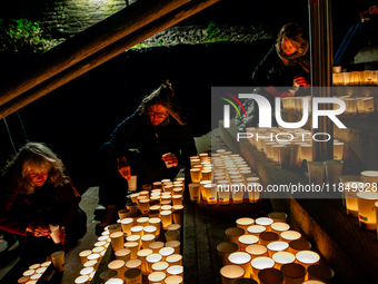 To commemorate World Candle Day, around 18,000 candles are lit in Nijmegen, The Netherlands, on December 8, 2024, to remember all deceased c...