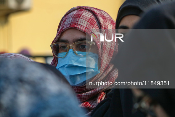 A student of Bachelor of Medicine and Bachelor of Surgery (MBBS) observes during a protest against excessive reservation in competitive exam...