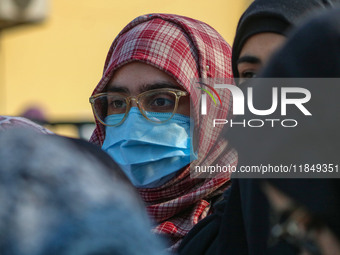 A student of Bachelor of Medicine and Bachelor of Surgery (MBBS) observes during a protest against excessive reservation in competitive exam...