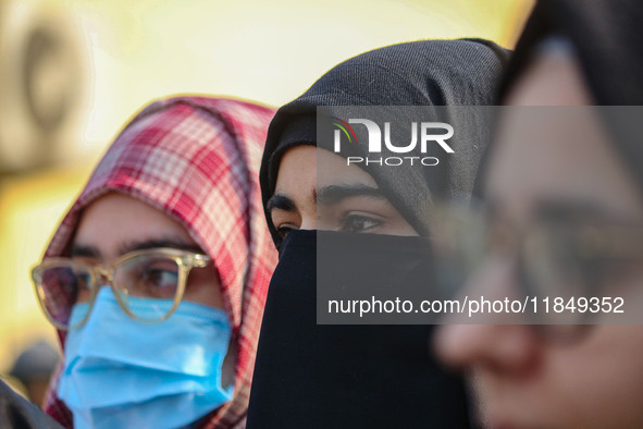 A student of Bachelor of Medicine and Bachelor of Surgery (MBBS) observes during a protest against excessive reservation in competitive exam...