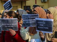 Students of Bachelor of Medicine and Bachelor of Surgery (MBBS) hold placards during a protest against excessive reservation in competitive...