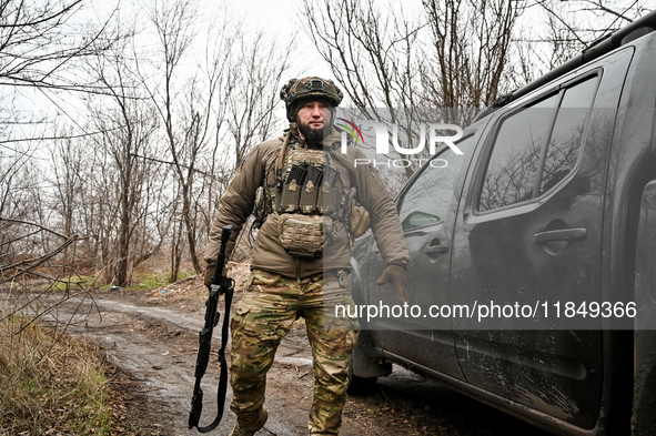 A serviceman of a self-propelled howitzer crew of Ukraine's 118th Separate Mechanized Brigade is at the positions in the Zaporizhzhia direct...