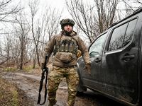 A serviceman of a self-propelled howitzer crew of Ukraine's 118th Separate Mechanized Brigade is at the positions in the Zaporizhzhia direct...