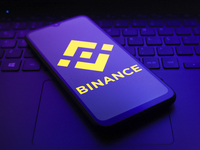 The logo of the cryptocurrency exchange Binance appears on the screen of a smartphone in Reno, United States, on December 9, 2024. (