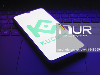 The logo of the cryptocurrency exchange KuCoin appears on the screen of a smartphone in Reno, United States, on December 9, 2024. (