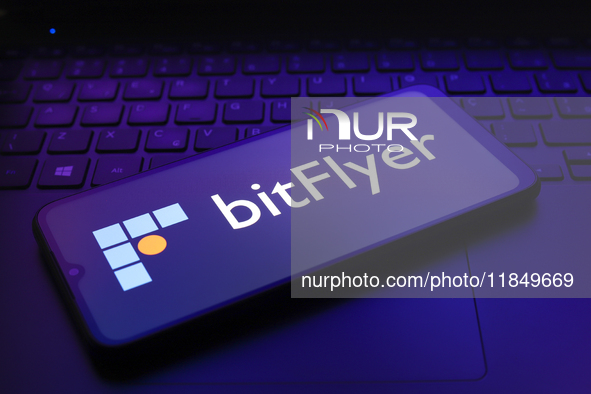 The logo of the cryptocurrency exchange bitFlyer appears on the screen of a smartphone in Reno, United States, on December 9, 2024. 