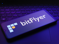 The logo of the cryptocurrency exchange bitFlyer appears on the screen of a smartphone in Reno, United States, on December 9, 2024. (