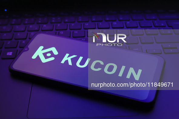 The logo of the cryptocurrency exchange KuCoin appears on the screen of a smartphone in Reno, United States, on December 9, 2024. 