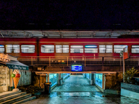 At Starnberg Station in Upper Bavaria, Germany, on December 7, 2024, a suburban S-Bahn train, line S6, moves at night, connecting the Munich...