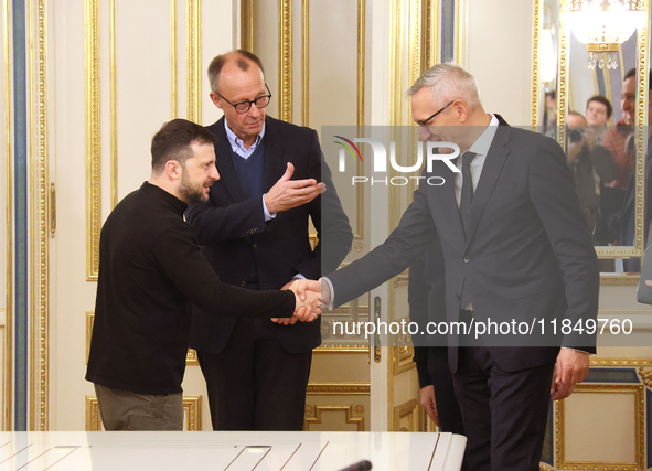 President of Ukraine Volodymyr Zelenskyy and German Chancellor candidate, leader of the Christian Democratic Union Friedrich Merz (L to R),...