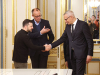 President of Ukraine Volodymyr Zelenskyy and German Chancellor candidate, leader of the Christian Democratic Union Friedrich Merz (L to R),...