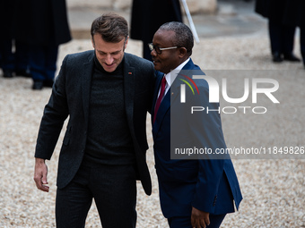 French President Emmanuel Macron receives the President of Guinea Bissau, Umaro Sissoco Embalo, at the Elysee Palace in Paris, France, on De...