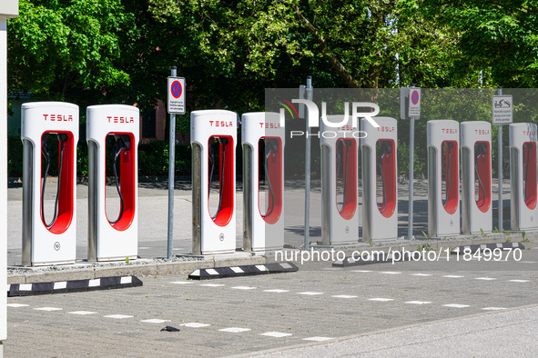 Tesla charging stations for electric cars are in Munich, Bavaria, Germany, on May 15, 2022. With its Superchargers, Tesla owns and operates...