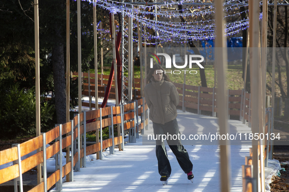 People ice skate in Ice Park Sofia at Knyazheska Garden in Sofia, Bulgaria, on December 9, 2024. 