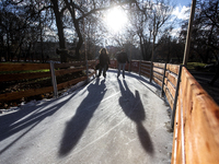 People ice skate in Ice Park Sofia at Knyazheska Garden in Sofia, Bulgaria, on December 9, 2024. (