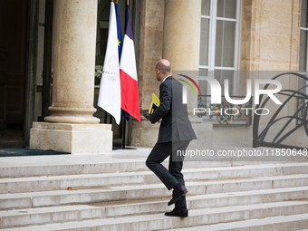 Jean-Noel Barrot, Minister for Europe and Foreign Affairs, arrives at the Elysee Palace to meet with French President Emmanuel Macron in Par...