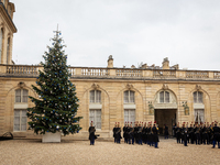 The French Republican Guard stands near the Christmas tree in the courtyard of the Elysee Palace in Paris, France, on September 12, 2024. (