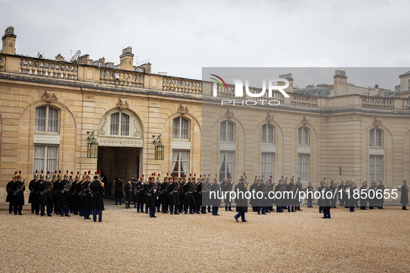 An illustration of the French Republican Guard is in the courtyard of the Elysee Palace in Paris, France, on September 12, 2024. 