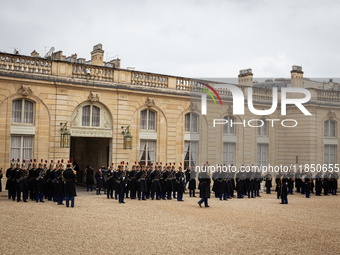 An illustration of the French Republican Guard is in the courtyard of the Elysee Palace in Paris, France, on September 12, 2024. (