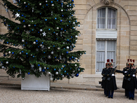 The French Republican Guard stands near the Christmas tree in the courtyard of the Elysee Palace in Paris, France, on September 12, 2024. (