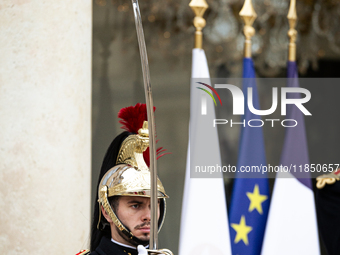 An element of the French Republican Guard stands at the entrance of the Elysee Palace in Paris, France, on September 12, 2024. (