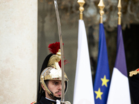 An element of the French Republican Guard stands at the entrance of the Elysee Palace in Paris, France, on September 12, 2024. (