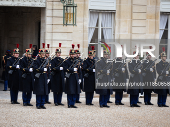 An illustration of the French Republican Guard is in the courtyard of the Elysee Palace in Paris, France, on September 12, 2024. (