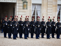 An illustration of the French Republican Guard is in the courtyard of the Elysee Palace in Paris, France, on September 12, 2024. (