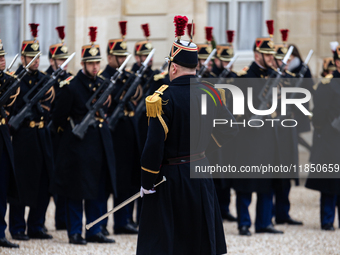 An illustration of the French Republican Guard is in the courtyard of the Elysee Palace in Paris, France, on September 12, 2024. (