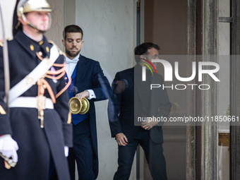 French President Emmanuel Macron stands at the entrance of the Elysee Palace before meeting with the President of Guinea-Bissau, Umaro Sisso...