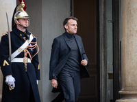 French President Emmanuel Macron stands at the entrance of the Elysee Palace before meeting with the President of Guinea-Bissau, Umaro Sisso...