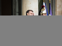 French President Emmanuel Macron stands at the entrance of the Elysee Palace before meeting with the President of Guinea-Bissau, Umaro Sisso...