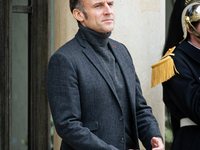 French President Emmanuel Macron stands at the entrance of the Elysee Palace before meeting with the President of Guinea-Bissau, Umaro Sisso...