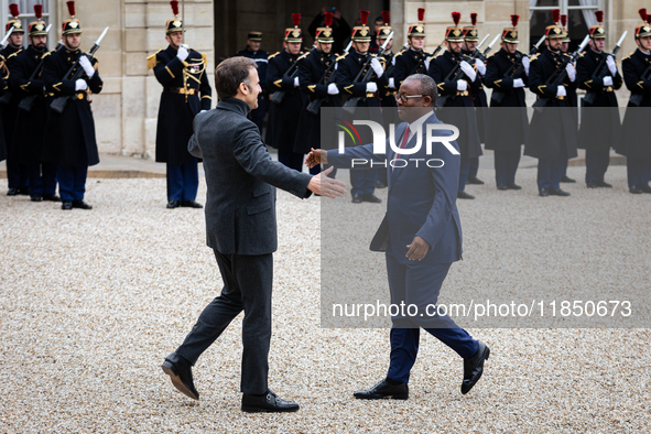 French President Emmanuel Macron welcomes Umaro Sissoco Embalo, the President of Guinea-Bissau, at the Elysee Palace in Paris, France, on Se...