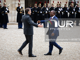 French President Emmanuel Macron welcomes Umaro Sissoco Embalo, the President of Guinea-Bissau, at the Elysee Palace in Paris, France, on Se...