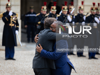 French President Emmanuel Macron welcomes Umaro Sissoco Embalo, the President of Guinea-Bissau, at the Elysee Palace in Paris, France, on Se...