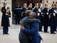 French President Emmanuel Macron welcomes Umaro Sissoco Embalo, the President of Guinea-Bissau, at the Elysee Palace in Paris, France, on Se...