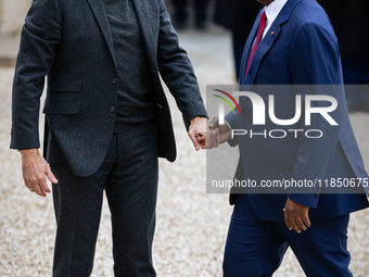 French President Emmanuel Macron welcomes Umaro Sissoco Embalo, the President of Guinea-Bissau, at the Elysee Palace in Paris, France, on Se...