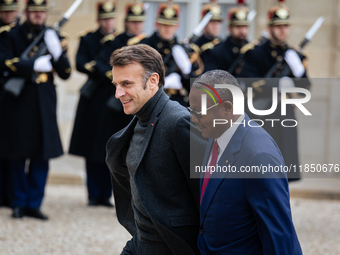 French President Emmanuel Macron welcomes Umaro Sissoco Embalo, the President of Guinea-Bissau, at the Elysee Palace in Paris, France, on Se...