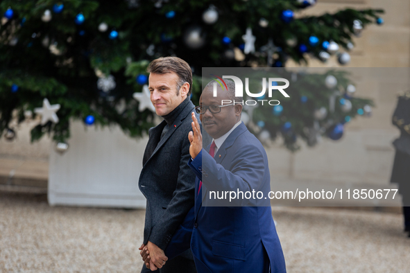 French President Emmanuel Macron welcomes Umaro Sissoco Embalo, the President of Guinea-Bissau, at the Elysee Palace in Paris, France, on Se...