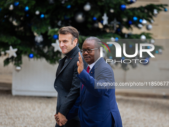 French President Emmanuel Macron welcomes Umaro Sissoco Embalo, the President of Guinea-Bissau, at the Elysee Palace in Paris, France, on Se...