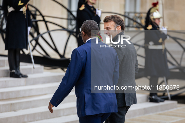 French President Emmanuel Macron welcomes Umaro Sissoco Embalo, the President of Guinea-Bissau, at the Elysee Palace in Paris, France, on Se...