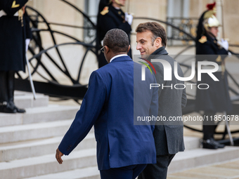 French President Emmanuel Macron welcomes Umaro Sissoco Embalo, the President of Guinea-Bissau, at the Elysee Palace in Paris, France, on Se...