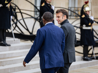 French President Emmanuel Macron welcomes Umaro Sissoco Embalo, the President of Guinea-Bissau, at the Elysee Palace in Paris, France, on Se...