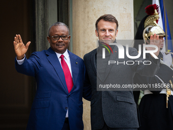 French President Emmanuel Macron welcomes Umaro Sissoco Embalo, the President of Guinea-Bissau, at the Elysee Palace in Paris, France, on Se...